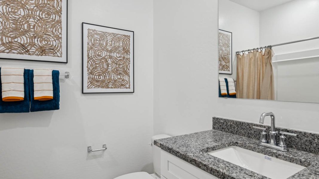 Furnished interior in a model home at Elena Trails in Maricopa (Image 40).