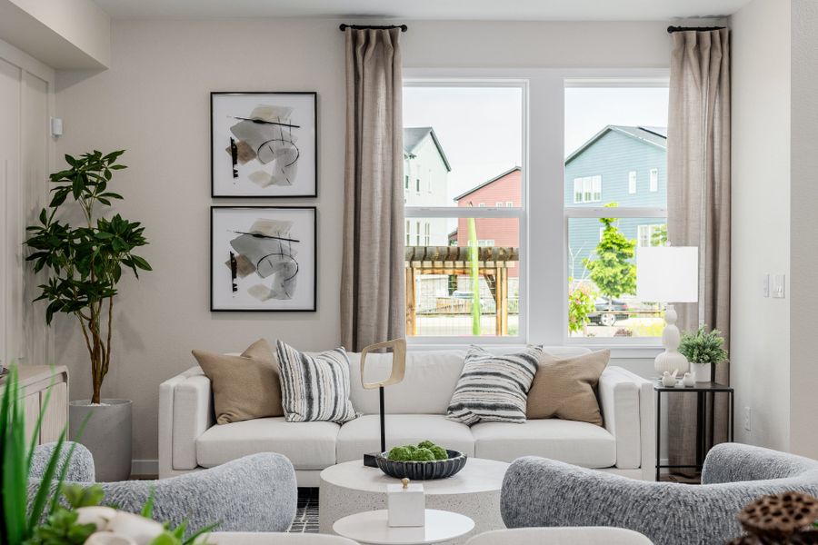 Furnished interior in a model home at Arras Park in Thornton (Image 34).