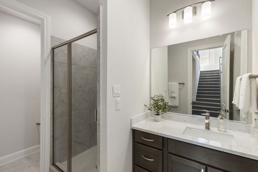 Furnished interior in a model home at Sunterra in Katy (Image 25).