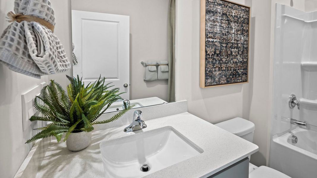 Furnished interior in a model home at East Ridge in Ayden (Image 23).