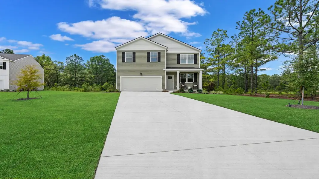 Front exterior of a home in the Cypress Landing community, located in Hardeeville, SC (Image 2). Front exterior of a home in the Cypress Landing community, located in Hardeeville, SC (Image 2).