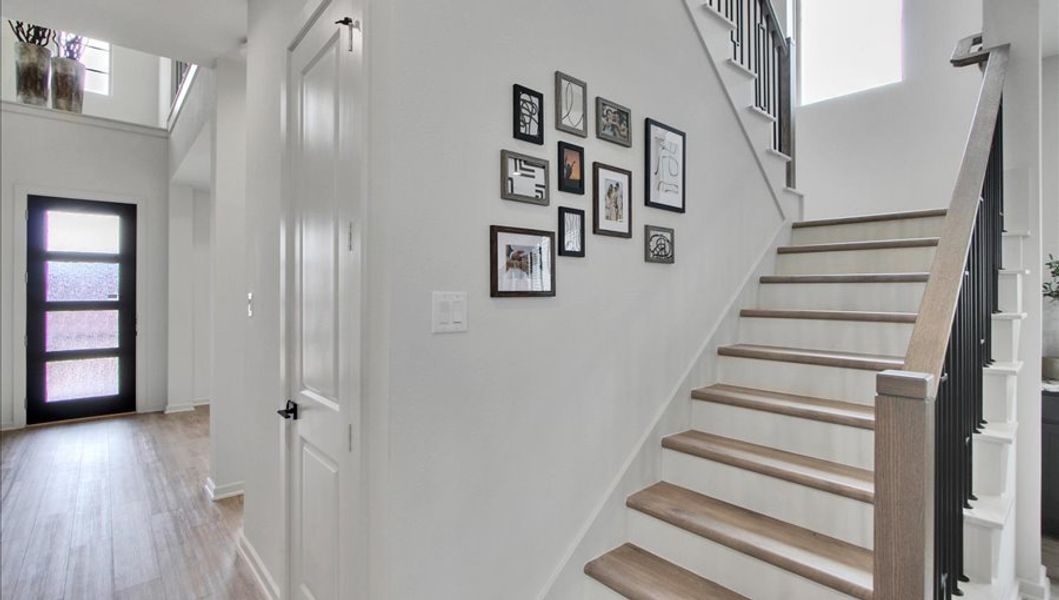Furnished interior in a model home at Canterra Creek  60' in Iowa Colony (Image 5).