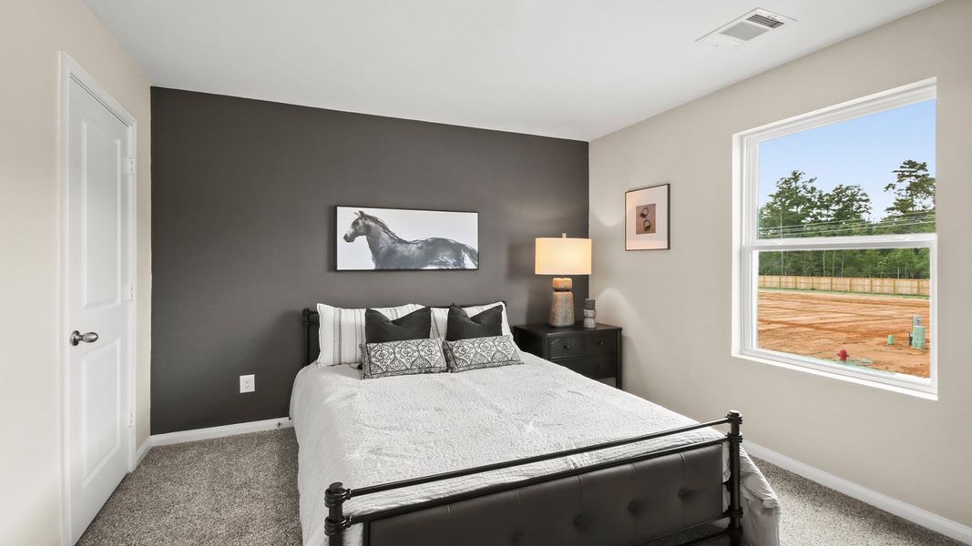 Furnished interior in a model home at McCrorey Trails in Conroe (Image 13).