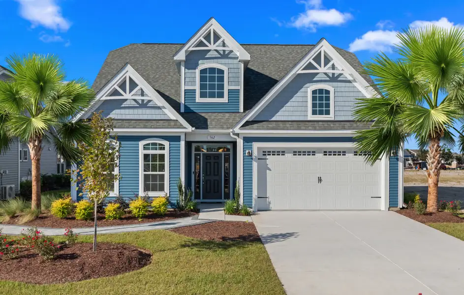Front exterior of a home in the Traditions at Carolina Forest community, located in Myrtle Beach, SC (Image 6).