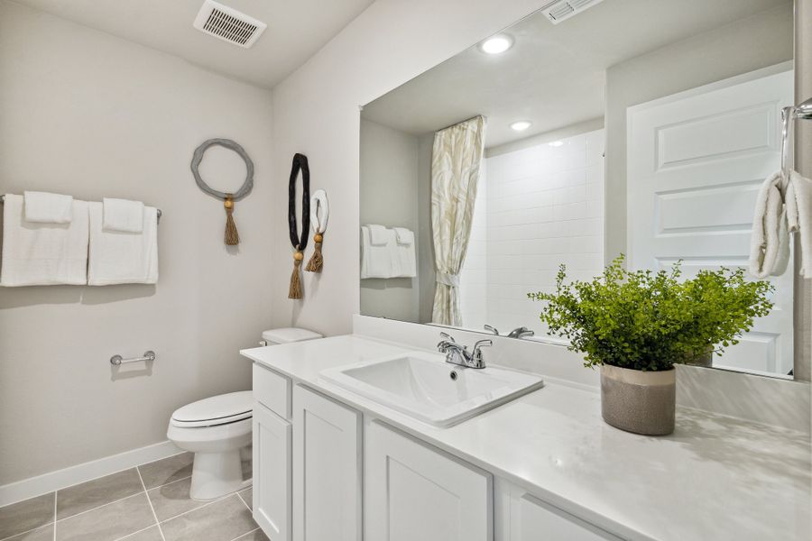 Bathroom in an Oak Model Home by Trophy Signature Homes