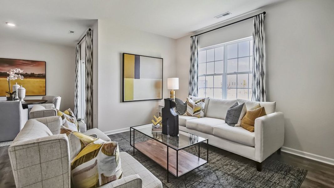 Furnished interior in a model home at The Reserve at Prestleigh in Wake Forest (Image 27).