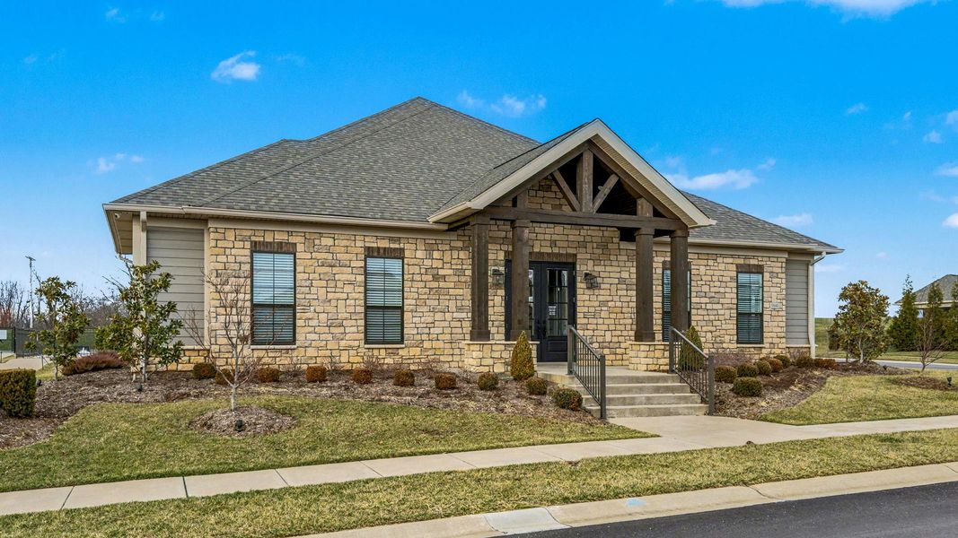 Front exterior of a home in the The Courtyards at Curry Farms community, located in Louisville, KY (Image 5).
