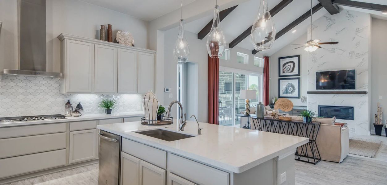 Furnished interior in a model home at Potranco Oaks 100's in Castroville (Image 9).