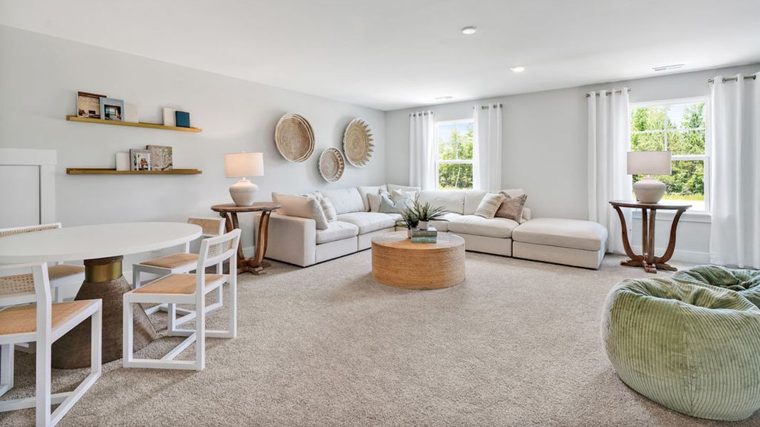 Furnished interior in a model home at Saltgrass Landing in Winnabow (Image 18).