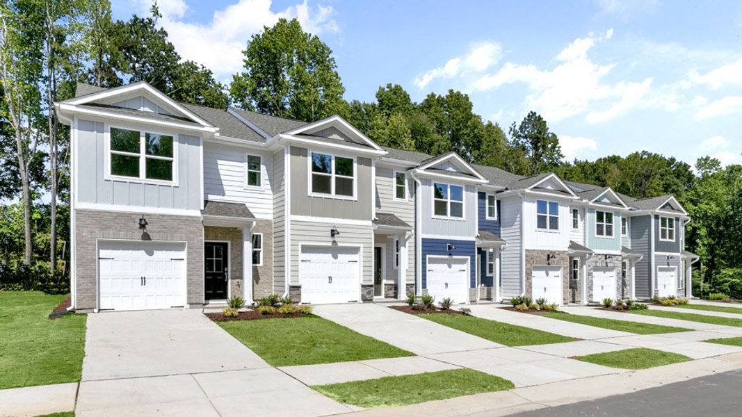 Front exterior of a home in the The Townes at Bexford community, located in Willow Spring, NC (Image 1).