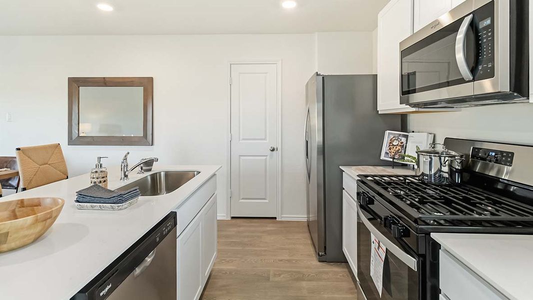Furnished interior in a model home at Hickory Ridge in Elmendorf (Image 17).