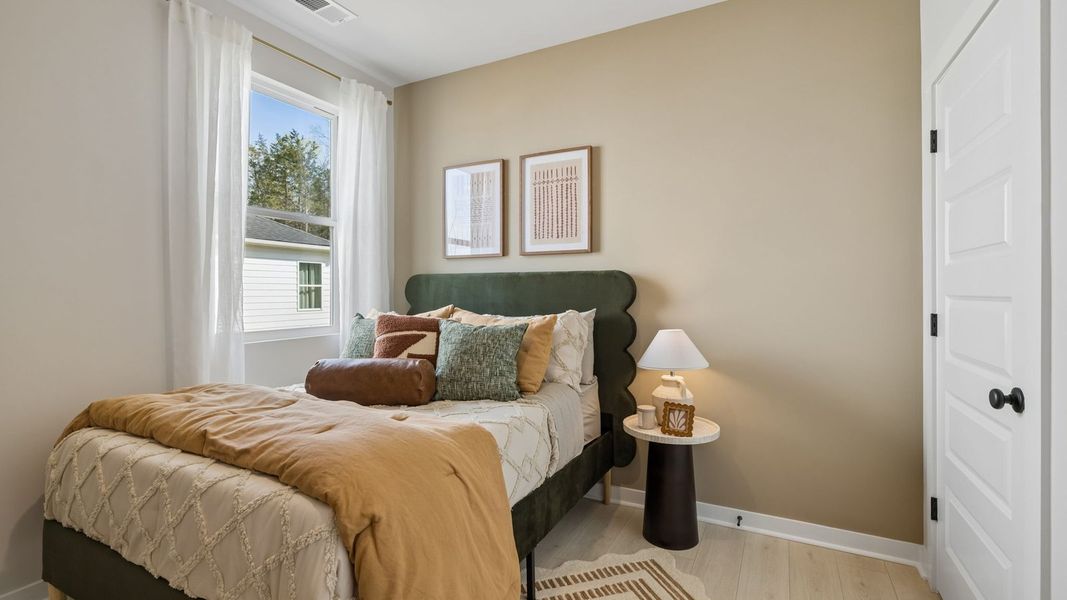 Furnished interior in a model home at Reserve at Hickory Ridge in Columbia (Image 59).