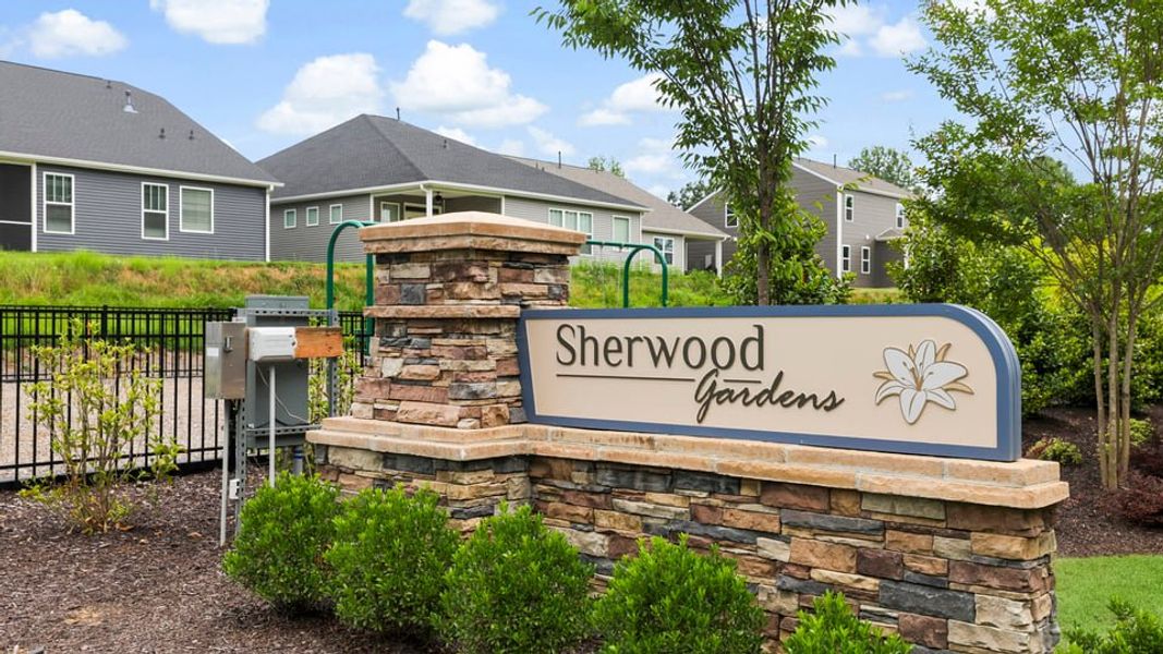 Entrance to the Sherwood Gardens community in Landrum, SC, featuring signage and landscaping (Image 14).