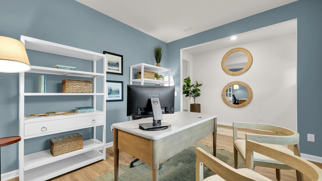 Furnished interior in a model home at The Cove at Mallard Crossing in Summerville (Image 19).