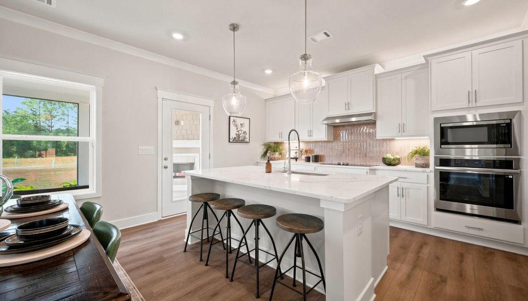 Furnished interior in a model home at Greenefield in Cartersville (Image 28).