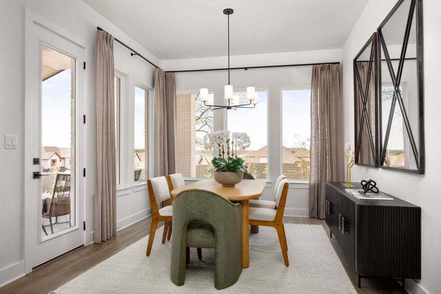 Furnished interior in a model home at Wolf Ranch in Georgetown (Image 35).