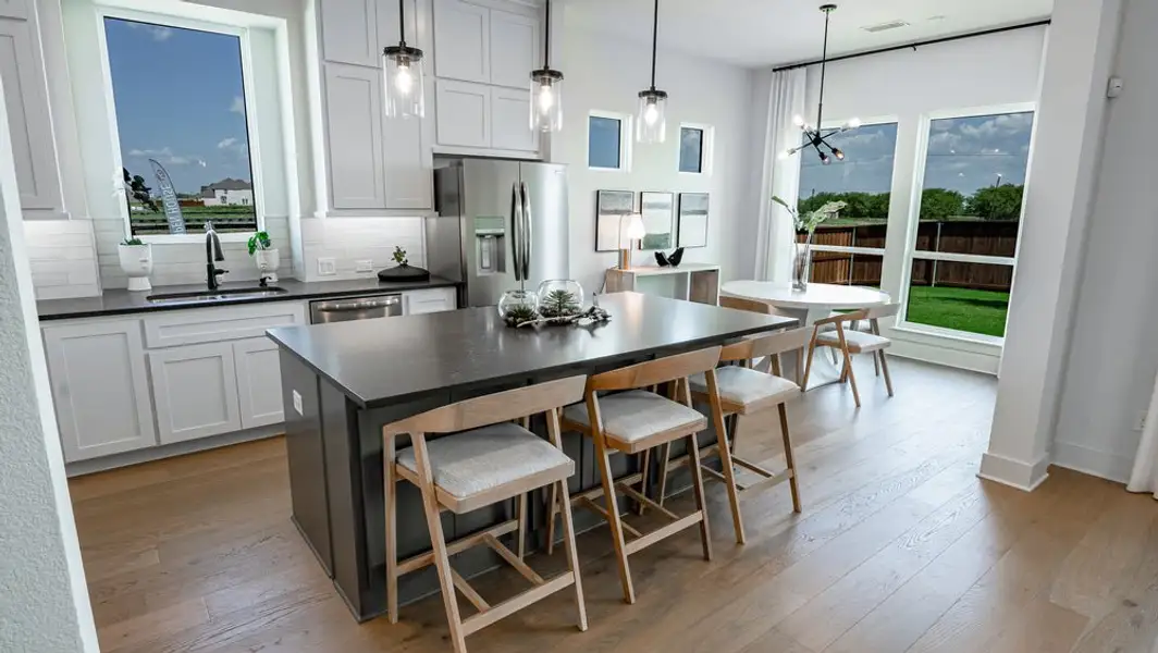 Furnished interior in a model home at Polo Ridge in Forney (Image 4).