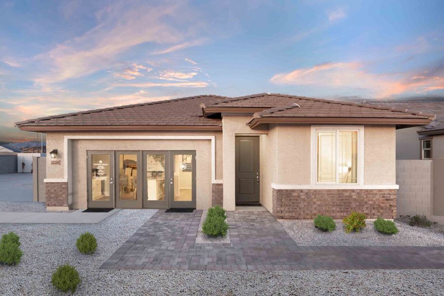 Front exterior of a home in the The Villas Collection at Copper Falls community, located in Buckeye, AZ (Image 10).