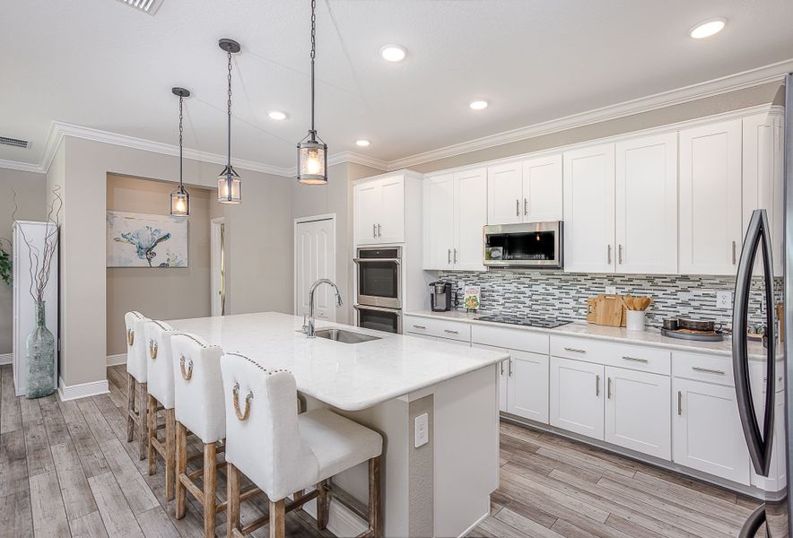 Furnished interior in a model home at Harbour Heights in Punta Gorda (Image 5).