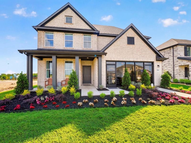 Front exterior of a home in the Parks at Foster Crossing community, located in Anna, TX (Image 4). Front exterior of a home in the Parks at Foster Crossing community, located in Anna, TX (Image 4).
