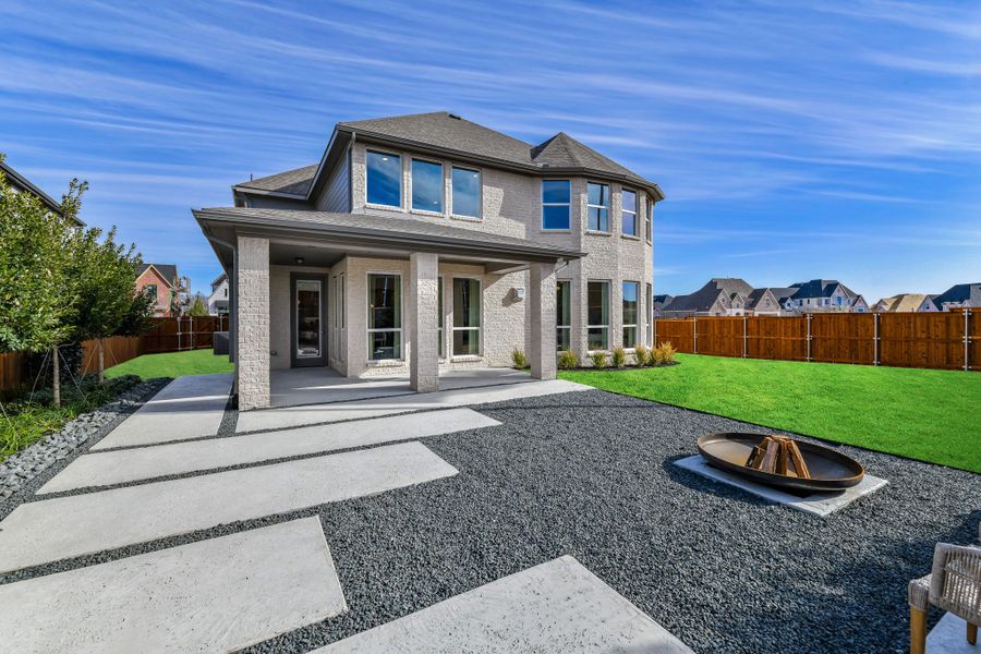 Front exterior of a home in the The Grove Frisco - 55s community, located in Frisco, TX (Image 5). Front exterior of a home in the The Grove Frisco - 55s community, located in Frisco, TX (Image 5).
