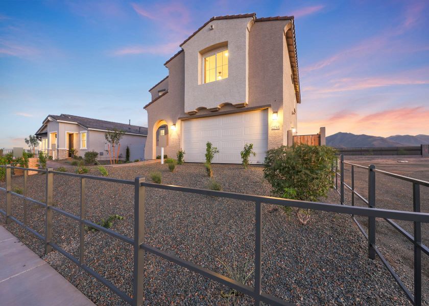 A house with a fence around it.