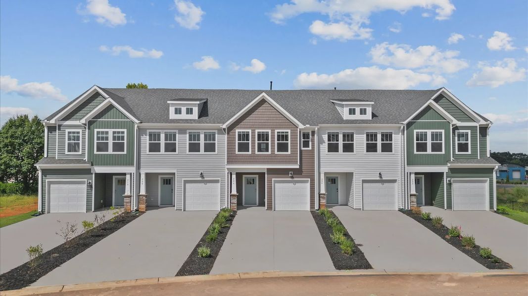 Exterior of two story townhome at Saluda Crossing by DRB Homes in Piedmont, SC Exterior of two story townhome at Saluda Crossing by DRB Homes in Piedmont, SC