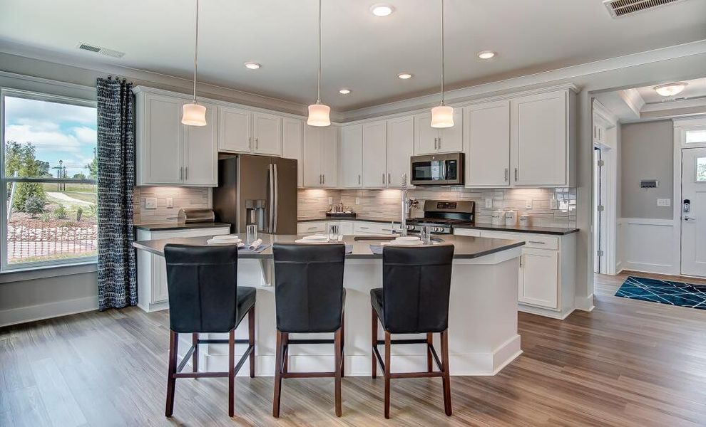 Furnished interior in a model home at Bryton Crossing Townhomes in Huntersville (Image 3). Furnished interior in a model home at Bryton Crossing Townhomes in Huntersville (Image 3).