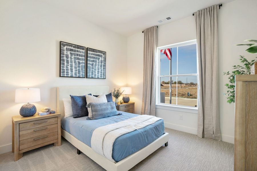 Furnished interior in a model home at Lily Creek at Sutton Fields in Aubrey (Image 75).