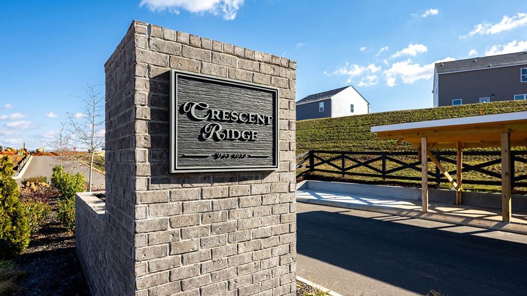 Entrance to the Crescent Ridge community in Niota, TN, featuring signage and landscaping (Image 2). Entrance to the Crescent Ridge community in Niota, TN, featuring signage and landscaping (Image 2).