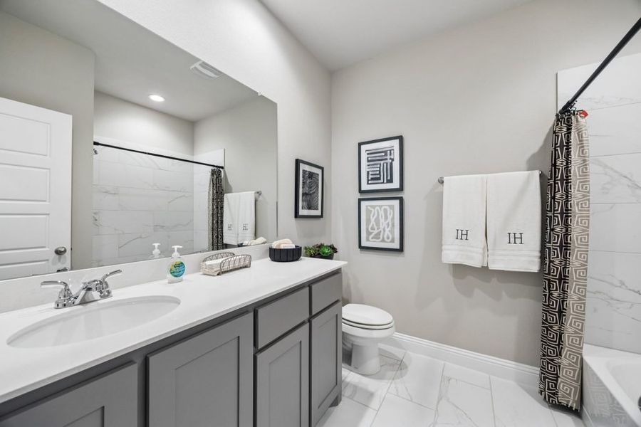 Furnished interior in a model home at Mercer Meadows in Royse City (Image 30).