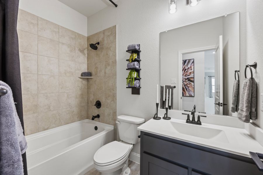 Furnished interior in a model home at Myrtle Creek in Waxahachie (Image 31).