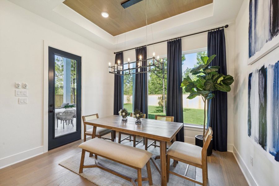 Furnished interior in a model home at Audubon - 70' in Magnolia (Image 11).