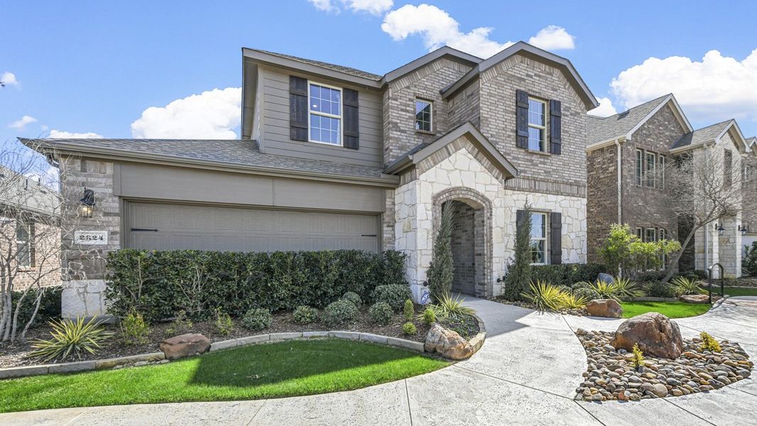 Front exterior of a home in the Silverado community, located in Aubrey, TX (Image 29). Front exterior of a home in the Silverado community, located in Aubrey, TX (Image 29).