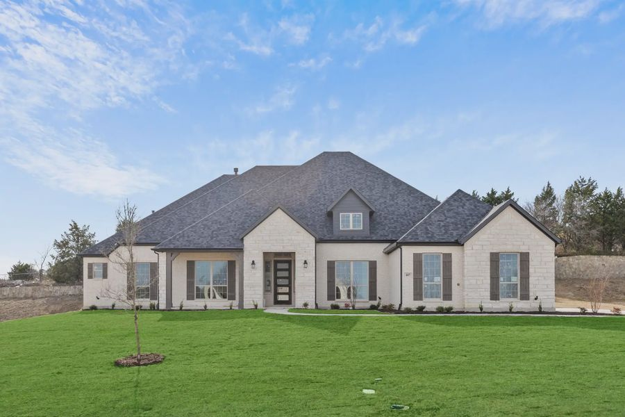 Front exterior of a home in the Ridge Pointe Estates community, located in Sunnyvale, TX (Image 13).
