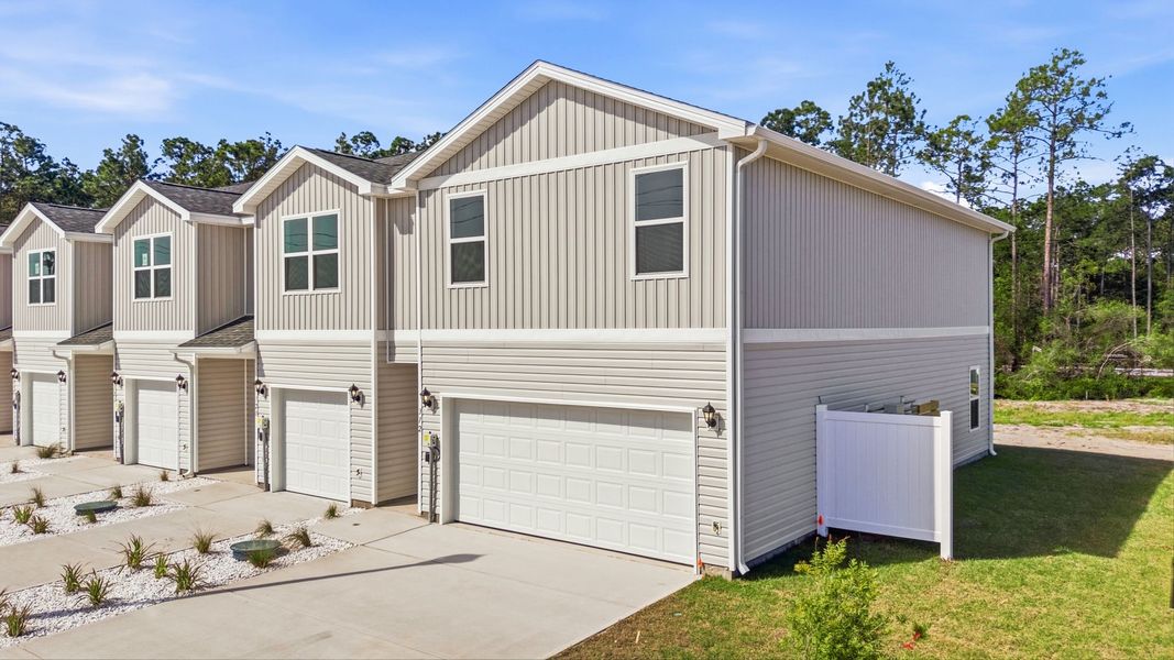 Front exterior of a home in the Chateau Nemours community, located in Port Saint Joe, FL (Image 12).