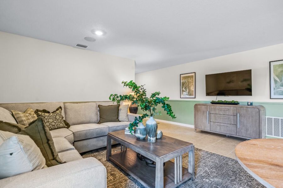 Furnished interior in a model home at Woodland Ranch Estates in Dundee (Image 5).