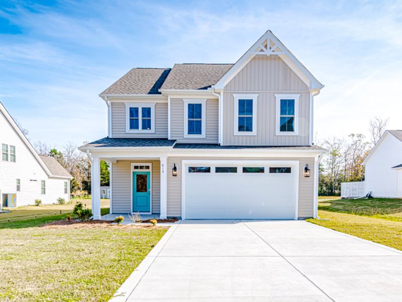 Front exterior of a home in the Coastal Haven community, located in Leland, NC (Image 10).