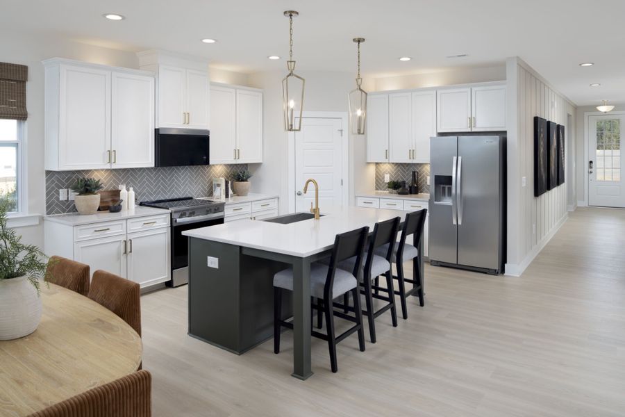 Furnished interior in a model home at Bloom in Fuquay Varina (Image 8). Furnished interior in a model home at Bloom in Fuquay Varina (Image 8).