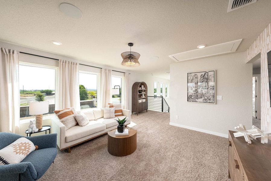 Furnished interior in a model home at Talley Fields in San Antonio (Image 34).