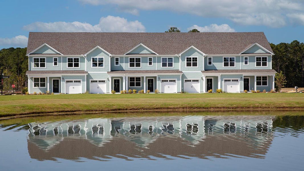 Front exterior of a home in the The Palms at Indigo Preserve Townhomes community, located in Leland, NC (Image 14).