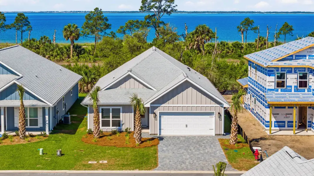 Front exterior of a home in the WindMark Beach Emerald Series community, located in Port Saint Joe, FL (Image 15). Front exterior of a home in the WindMark Beach Emerald Series community, located in Port Saint Joe, FL (Image 15).