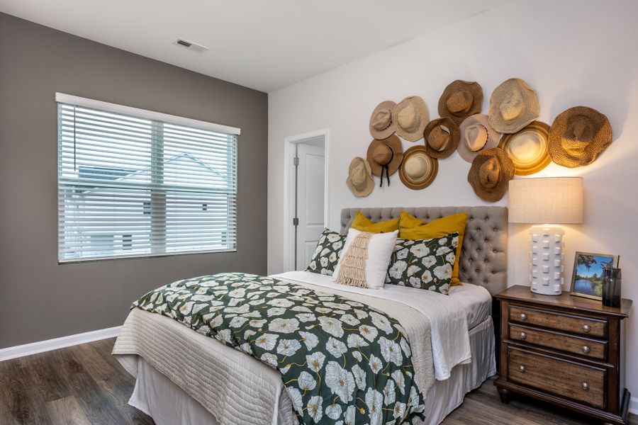 Furnished interior in a model home at Coastal Haven Townes in Leland (Image 9).