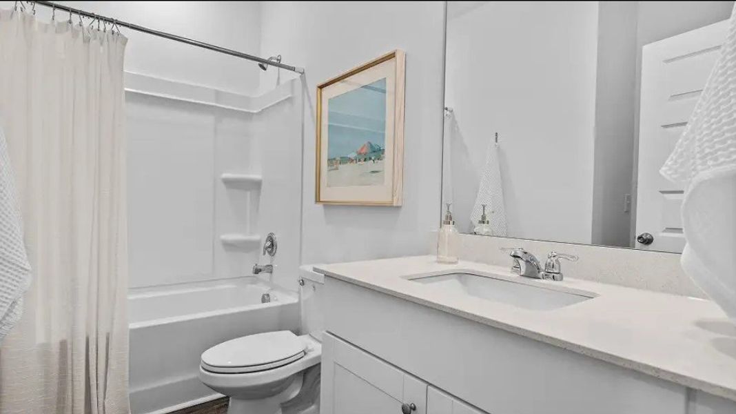 Furnished interior in a model home at Champions Park in Longs (Image 7).