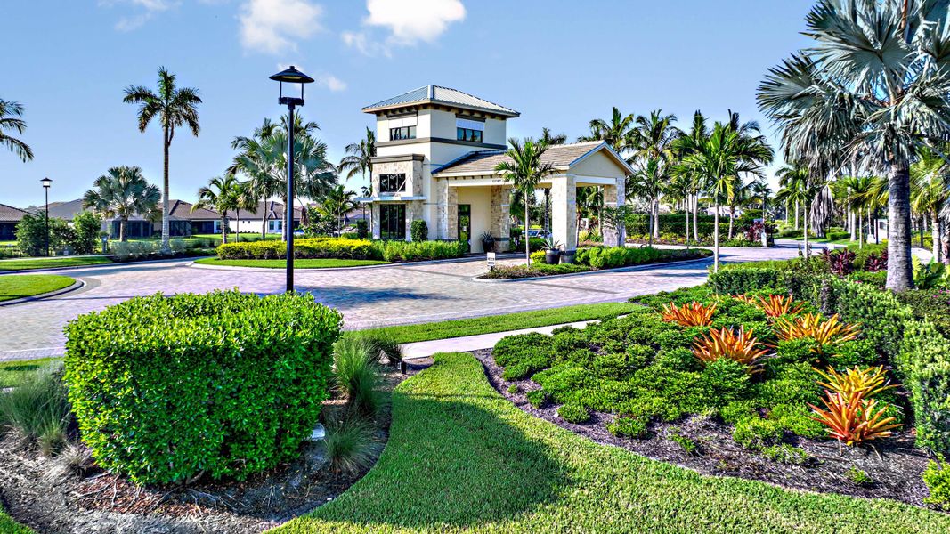 Front exterior of a home in the Esplanade by the Islands Coach Homes community, located in Naples, FL (Image 12).