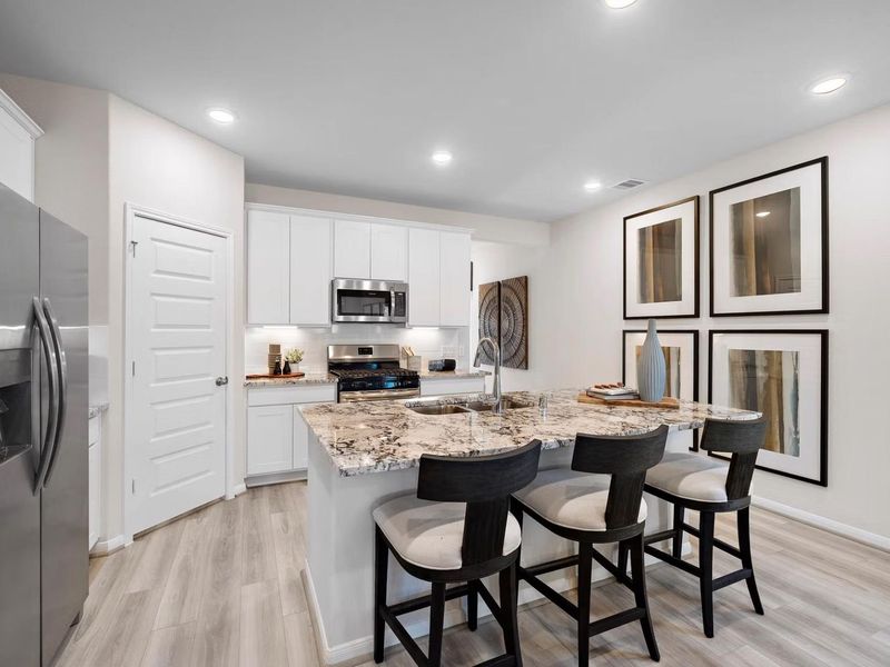 Furnished interior in a model home at Saddle Creek Ranch in Cibolo (Image 9).