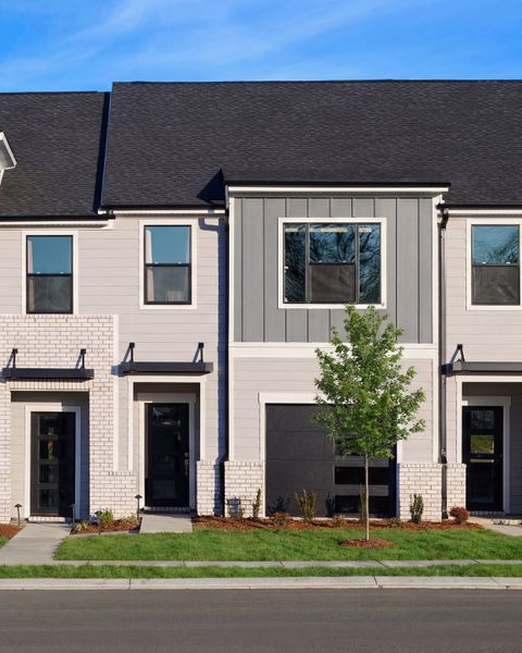 Front exterior of a home in the Nexus Townhomes community, located in Gallatin, TN (Image 6).