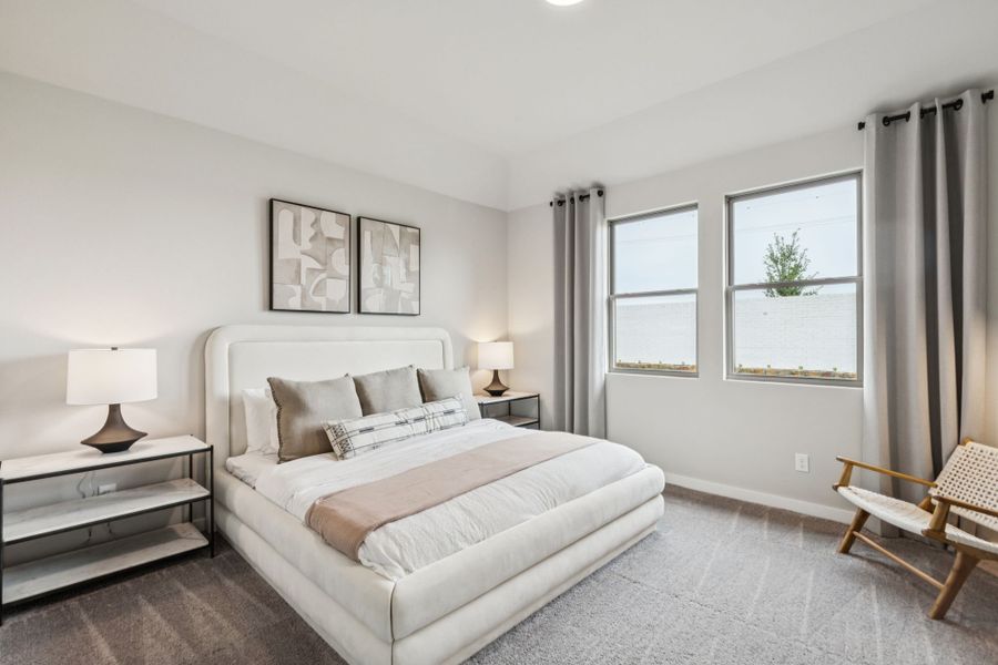 REPRESENTATIVE PHOTO – Primary Suite in a Lakehaven Oak model home in Farmersville TX by Trophy Signature Homes