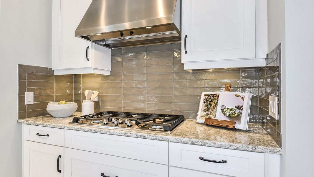 Furnished interior in a model home at Esplanade by the Islands in Naples (Image 47).