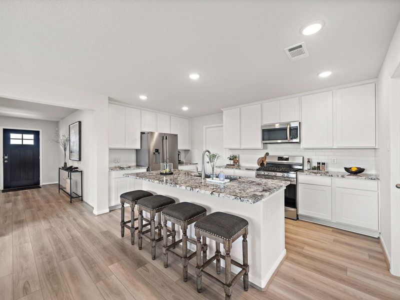 Furnished interior in a model home at Enclave at Newport in Crosby (Image 7).
